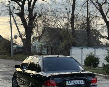 Чорний Міцубісі Lancer, об'ємом двигуна 1.6 л та пробігом 98 тис. км за 5600 $, фото 1 на Automoto.ua