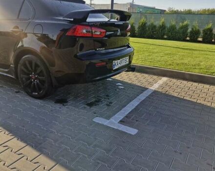 Черный Мицубиси Лансер, объемом двигателя 2 л и пробегом 184 тыс. км за 6999 $, фото 10 на Automoto.ua