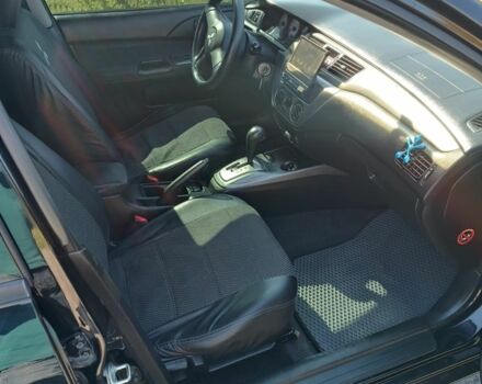 Чорний Міцубісі Lancer, об'ємом двигуна 1.6 л та пробігом 215 тис. км за 5200 $, фото 4 на Automoto.ua