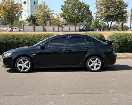 Черный Мицубиси Лансер, объемом двигателя 2 л и пробегом 216 тыс. км за 6950 $, фото 2 на Automoto.ua