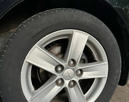 Чорний Міцубісі Lancer, об'ємом двигуна 2 л та пробігом 253 тис. км за 7300 $, фото 6 на Automoto.ua