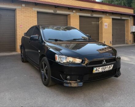 Чорний Міцубісі Lancer, об'ємом двигуна 2 л та пробігом 209 тис. км за 7600 $, фото 3 на Automoto.ua
