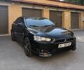 Чорний Міцубісі Lancer, об'ємом двигуна 2 л та пробігом 209 тис. км за 7600 $, фото 3 на Automoto.ua