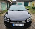 Чорний Міцубісі Lancer, об'ємом двигуна 2 л та пробігом 195 тис. км за 5500 $, фото 1 на Automoto.ua