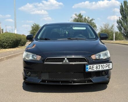 Черный Мицубиси Лансер, объемом двигателя 2 л и пробегом 216 тыс. км за 6950 $, фото 1 на Automoto.ua