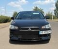 Чорний Міцубісі Lancer, об'ємом двигуна 2 л та пробігом 216 тис. км за 6950 $, фото 1 на Automoto.ua