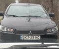Черный Мицубиси Лансер, объемом двигателя 1.5 л и пробегом 247 тыс. км за 6900 $, фото 11 на Automoto.ua