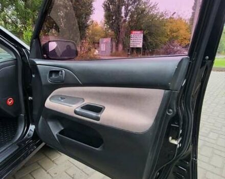 Черный Мицубиси Лансер, объемом двигателя 1.6 л и пробегом 290 тыс. км за 4350 $, фото 16 на Automoto.ua