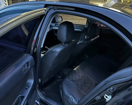 Чорний Міцубісі Lancer, об'ємом двигуна 1.5 л та пробігом 182 тис. км за 7400 $, фото 8 на Automoto.ua