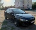 Черный Мицубиси Лансер, объемом двигателя 1.5 л и пробегом 121 тыс. км за 6700 $, фото 1 на Automoto.ua