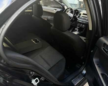 Мицубиси Лансер 2010 в Киеве на Automoto.ua Черный Мицубиси Лансер, объемом двигателя 2 л и пробегом 189 тыс. км за 5700 $, фото 21 на Automoto.ua