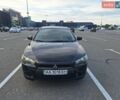 Черный Мицубиси Лансер, объемом двигателя 1.5 л и пробегом 328 тыс. км за 4500 $, фото 1 на Automoto.ua