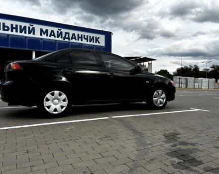 Чорний Міцубісі Lancer, об'ємом двигуна 1.5 л та пробігом 261 тис. км за 4600 $, фото 4 на Automoto.ua