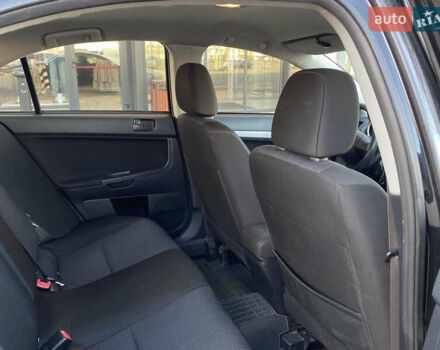 Чорний Міцубісі Lancer, об'ємом двигуна 1.5 л та пробігом 203 тис. км за 6250 $, фото 25 на Automoto.ua