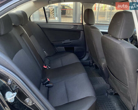 Чорний Міцубісі Lancer, об'ємом двигуна 1.5 л та пробігом 203 тис. км за 6250 $, фото 27 на Automoto.ua
