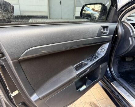 Мицубиси Лансер 2010 в Киеве на Automoto.ua Черный Мицубиси Лансер, объемом двигателя 2 л и пробегом 189 тыс. км за 5700 $, фото 18 на Automoto.ua