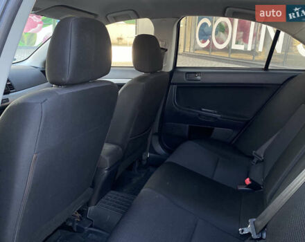 Чорний Міцубісі Lancer, об'ємом двигуна 1.5 л та пробігом 203 тис. км за 6250 $, фото 22 на Automoto.ua