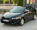 Чорний Міцубісі Lancer, об'ємом двигуна 2 л та пробігом 13 тис. км за 11800 $, фото 1 на Automoto.ua