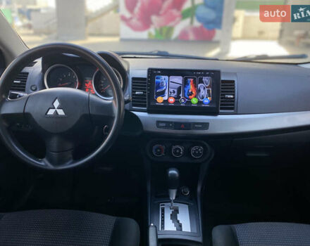 Чорний Міцубісі Lancer, об'ємом двигуна 1.5 л та пробігом 203 тис. км за 6250 $, фото 10 на Automoto.ua