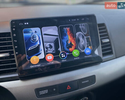 Чорний Міцубісі Lancer, об'ємом двигуна 1.5 л та пробігом 203 тис. км за 6250 $, фото 13 на Automoto.ua