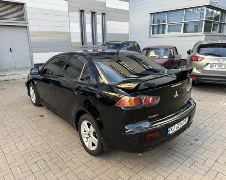 Мицубиси Лансер 2010 в Киеве на Automoto.ua Черный Мицубиси Лансер, объемом двигателя 2 л и пробегом 189 тыс. км за 5700 $, фото 11 на Automoto.ua