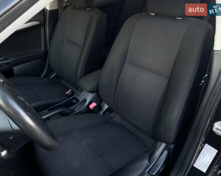 Черный Мицубиси Лансер, объемом двигателя 1.5 л и пробегом 203 тыс. км за 5990 $, фото 16 на Automoto.ua