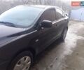 Чорний Міцубісі Lancer, об'ємом двигуна 1.5 л та пробігом 103 тис. км за 7048 $, фото 1 на Automoto.ua
