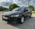 Чорний Міцубісі Lancer, об'ємом двигуна 2 л та пробігом 292 тис. км за 7500 $, фото 1 на Automoto.ua