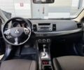 Мицубиси Лансер 2010 в Киеве на Automoto.ua Черный Мицубиси Лансер, объемом двигателя 2 л и пробегом 189 тыс. км за 5700 $, фото 20 на Automoto.ua