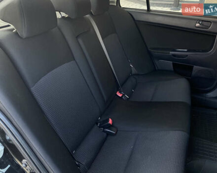 Черный Мицубиси Лансер, объемом двигателя 1.5 л и пробегом 203 тыс. км за 5990 $, фото 25 на Automoto.ua