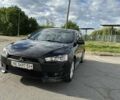 Чорний Міцубісі Lancer, об'ємом двигуна 2 л та пробігом 292 тис. км за 7500 $, фото 22 на Automoto.ua