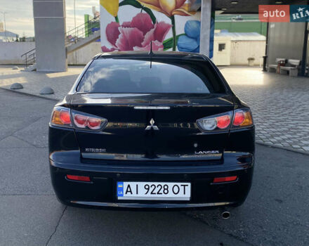 Черный Мицубиси Лансер, объемом двигателя 1.5 л и пробегом 203 тыс. км за 5990 $, фото 9 на Automoto.ua