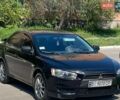 Черный Мицубиси Лансер, объемом двигателя 1.5 л и пробегом 170 тыс. км за 6100 $, фото 1 на Automoto.ua