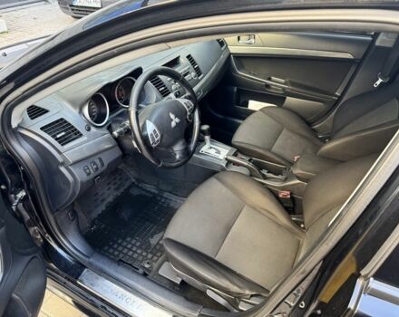 Мицубиси Лансер 2010 в Киеве на Automoto.ua Черный Мицубиси Лансер, объемом двигателя 2 л и пробегом 189 тыс. км за 5700 $, фото 17 на Automoto.ua