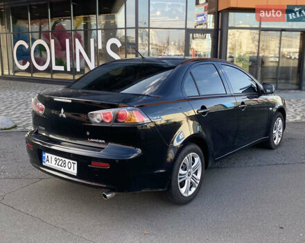 Чорний Міцубісі Lancer, об'ємом двигуна 1.5 л та пробігом 203 тис. км за 6250 $, фото 7 на Automoto.ua