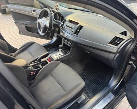 Мицубиси Лансер 2010 в Киеве на Automoto.ua Черный Мицубиси Лансер, объемом двигателя 2 л и пробегом 189 тыс. км за 5700 $, фото 22 на Automoto.ua