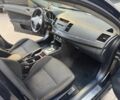 Мицубиси Лансер 2010 в Киеве на Automoto.ua Черный Мицубиси Лансер, объемом двигателя 2 л и пробегом 189 тыс. км за 5700 $, фото 22 на Automoto.ua