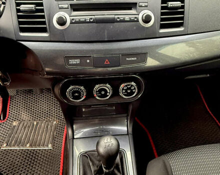 Черный Мицубиси Лансер, объемом двигателя 2 л и пробегом 169 тыс. км за 6800 $, фото 28 на Automoto.ua