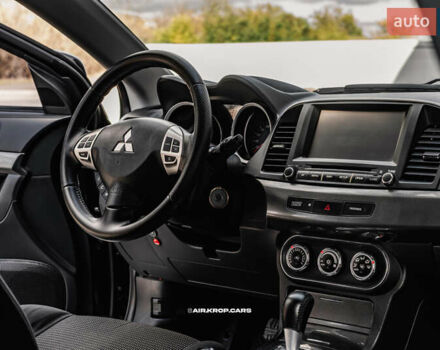 Чорний Міцубісі Lancer, об'ємом двигуна 2 л та пробігом 204 тис. км за 9500 $, фото 30 на Automoto.ua