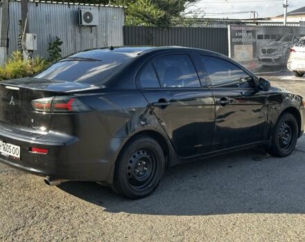 Черный Мицубиси Лансер, объемом двигателя 1.5 л и пробегом 239 тыс. км за 4300 $, фото 9 на Automoto.ua