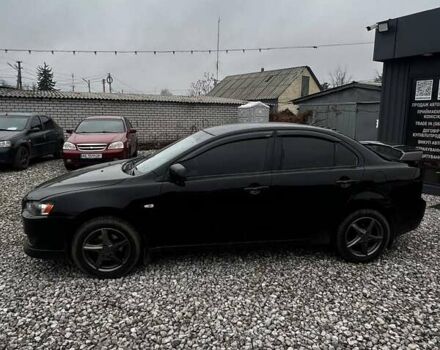 Черный Мицубиси Лансер, объемом двигателя 1.5 л и пробегом 250 тыс. км за 4800 $, фото 1 на Automoto.ua