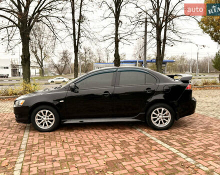 Черный Мицубиси Лансер, объемом двигателя 2 л и пробегом 169 тыс. км за 6800 $, фото 23 на Automoto.ua