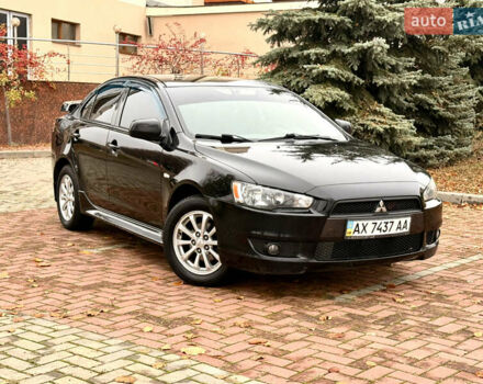 Черный Мицубиси Лансер, объемом двигателя 2 л и пробегом 169 тыс. км за 6800 $, фото 18 на Automoto.ua
