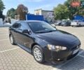 Черный Мицубиси Лансер, объемом двигателя 1.5 л и пробегом 260 тыс. км за 7000 $, фото 11 на Automoto.ua