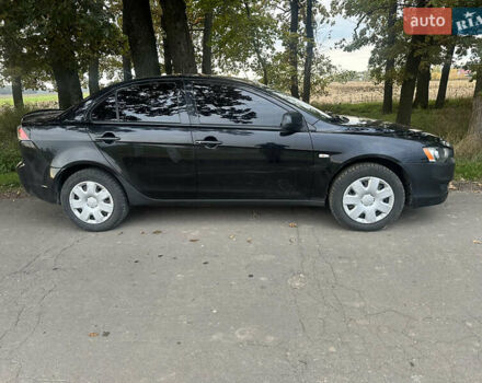 Черный Мицубиси Лансер, объемом двигателя 1.5 л и пробегом 202 тыс. км за 6500 $, фото 4 на Automoto.ua