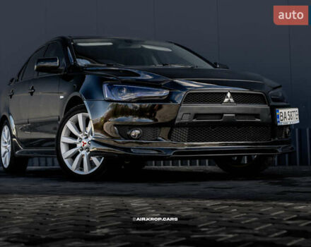 Чорний Міцубісі Lancer, об'ємом двигуна 2 л та пробігом 204 тис. км за 9500 $, фото 12 на Automoto.ua
