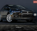 Чорний Міцубісі Lancer, об'ємом двигуна 2 л та пробігом 204 тис. км за 9500 $, фото 12 на Automoto.ua