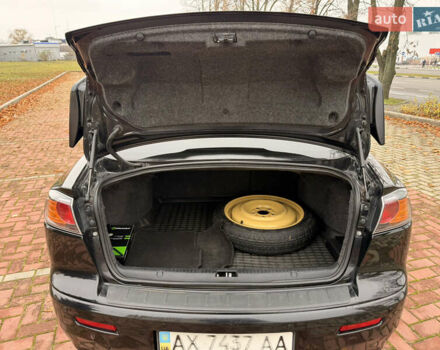 Черный Мицубиси Лансер, объемом двигателя 2 л и пробегом 169 тыс. км за 6800 $, фото 35 на Automoto.ua