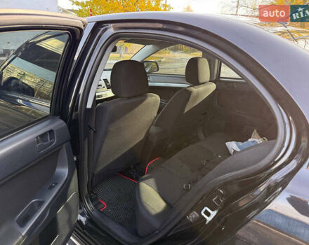 Мицубиси Лансер 2011 в Полтаве на Automoto.ua Черный Мицубиси Лансер, объемом двигателя 1.5 л и пробегом 246 тыс. км за 6300 $, фото 8 на Automoto.ua