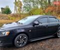 Чорний Міцубісі Lancer, об'ємом двигуна 1.5 л та пробігом 197 тис. км за 7500 $, фото 2 на Automoto.ua